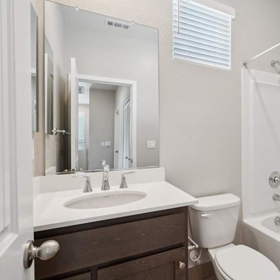 modern bathroom fittings at montessa apartments, california