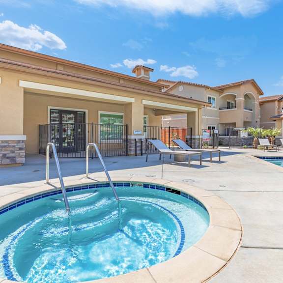 the preserve at ballantyne commons pool with a hot tub and a pool house at heritage landing apartments, chico, ca