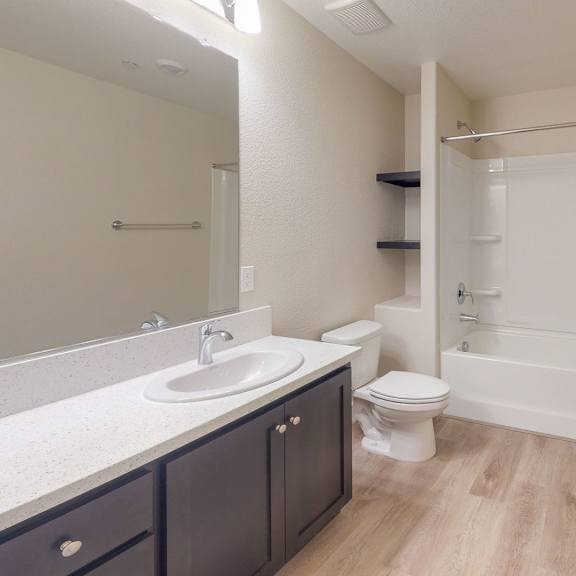 a bathroom with a sink toilet and a shower at heritage landing apartments, chico, ca, 95973