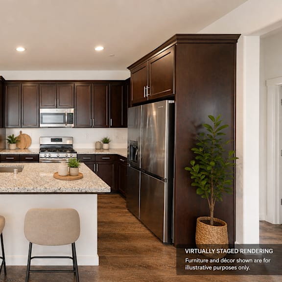 a modern kitchen with dark brown cabinets and a white island.