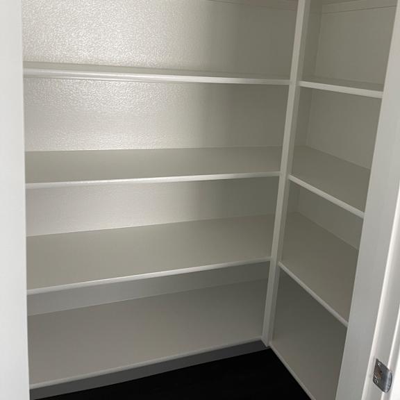 a white ceiling with a grid of panels.