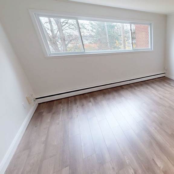 a room with a window and a door.
