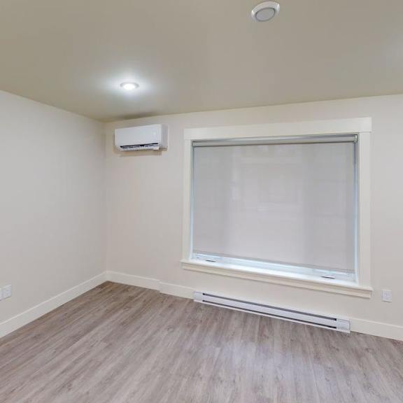 a room with a window and a door.