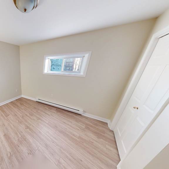 a room with a window and a door.