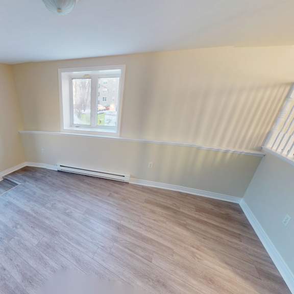 a room with a door and a window.