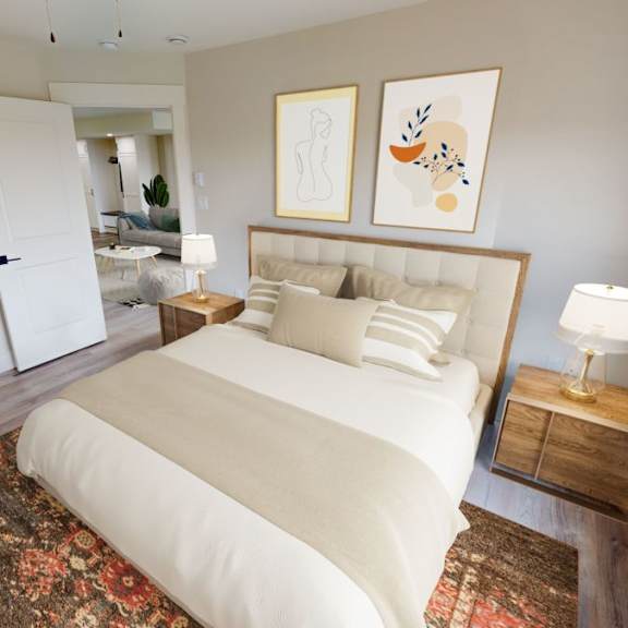 a bedroom with a large bed and a rug on the floor.