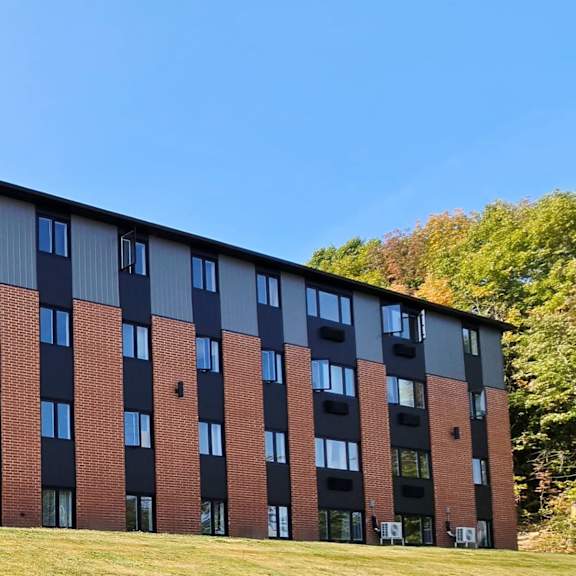 a large building with a lot of windows and a number 9 on the side.