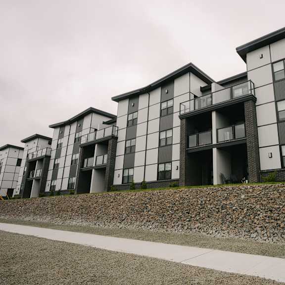 a modern building with a black and white facade.