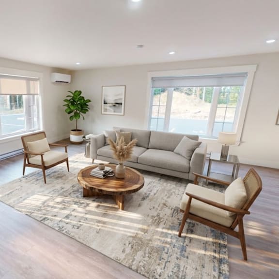 a living room with a couch, chair, and coffee table.