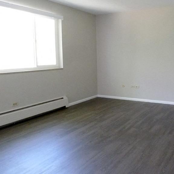 a room with a window and a door.