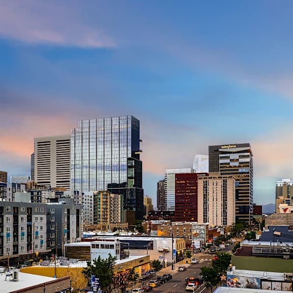 a cityscape with buildings and a clear sky.
