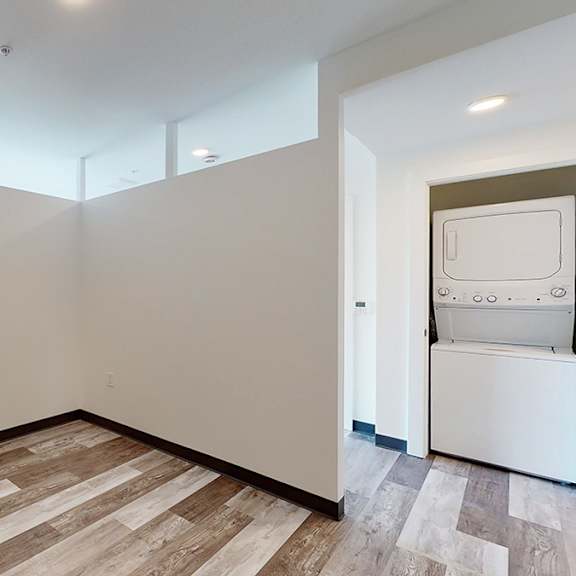 a room with a washing machine in it.