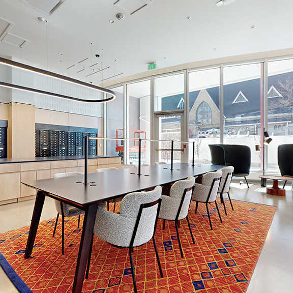 a conference room with a long table and chairs.