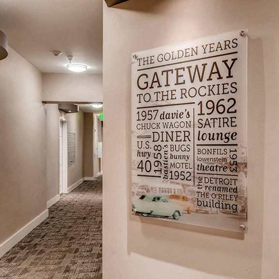 a poster on a wall that says "the golden years gateway to the rockies".