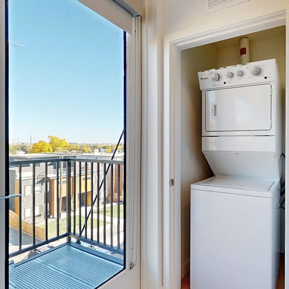 a white oven and fridge in a small kitchen.