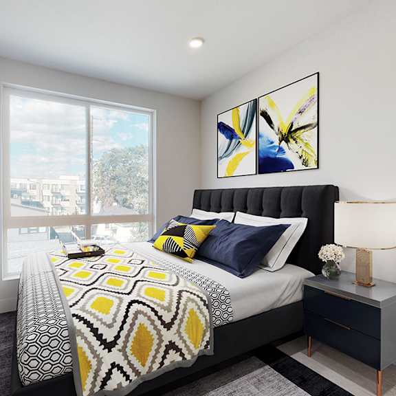 a bedroom with a large bed and a painting on the wall.