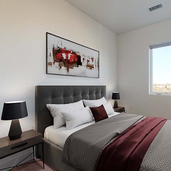 a bedroom with a large bed and a painting on the wall.