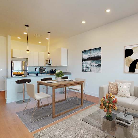 a modern living room with a glass coffee table and a white sofa.