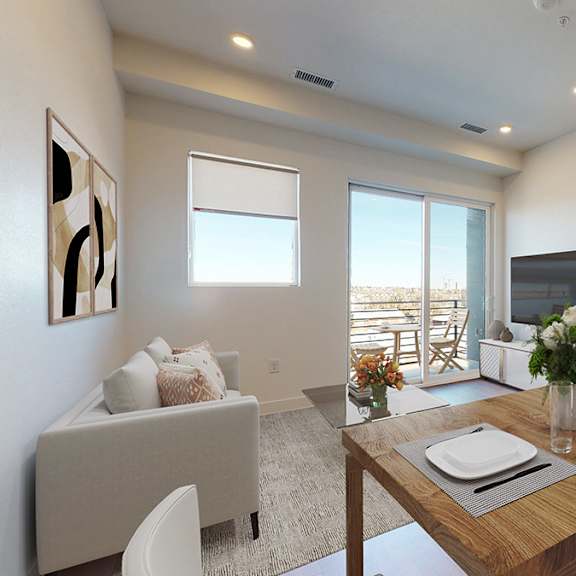 a modern dining room with a wooden table set for two.
