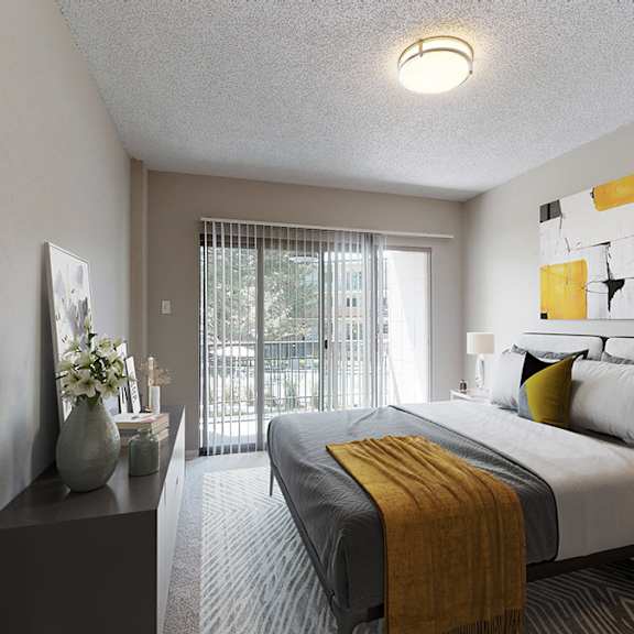 a bedroom with a large bed and a painting on the wall.