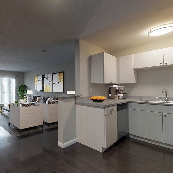 a modern kitchen with white cabinets and a large island.