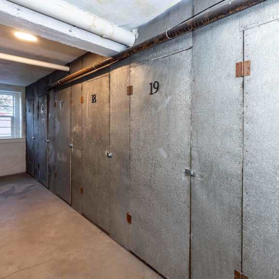 a row of concrete lockers numbered 19 and 20.