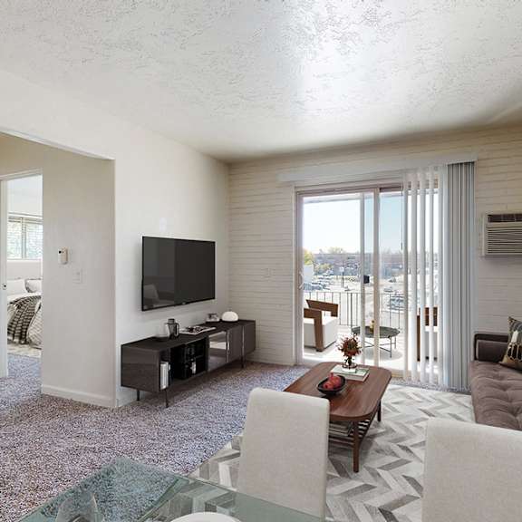 a living room with a brown couch and a television.