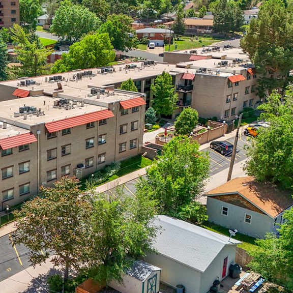 view of villa parada from the air, showing the building and parking spaces