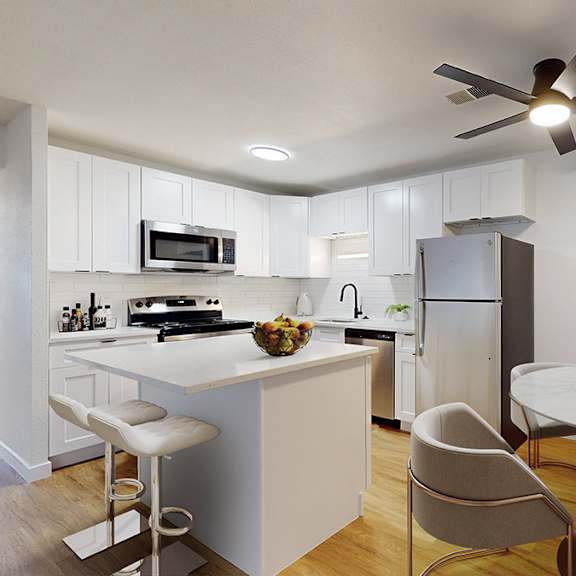 a modern kitchen with a dining table and chairs.