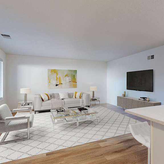 a modern living room with a white sofa set and a television.
