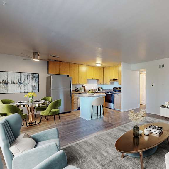 a modern living room with a grey sofa and a coffee table.