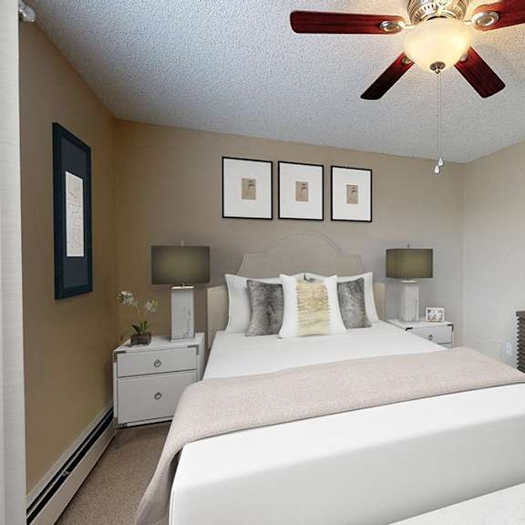 a bedroom with two beds, a dresser, and a ceiling fan.