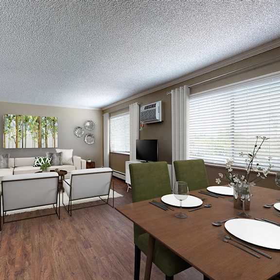 a dining room with a table set for four.