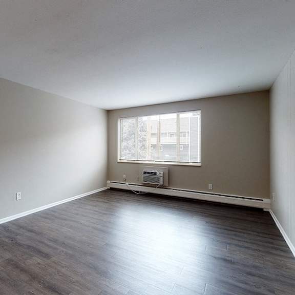 a room with a door and a window.