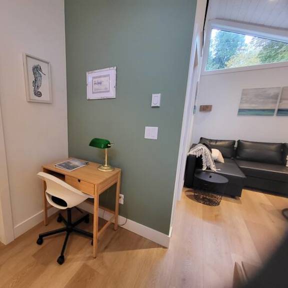 a room with a desk and a chair.