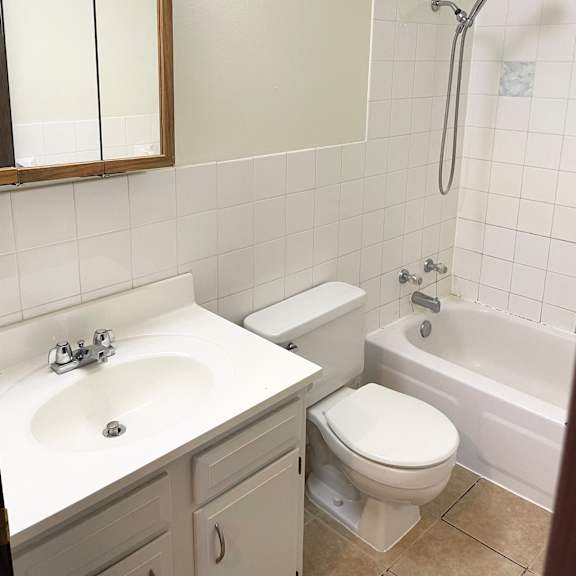 ceramic tiled bathroom.