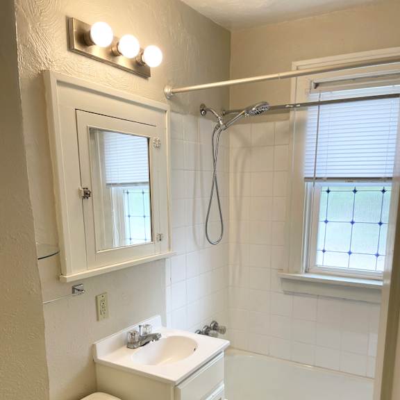 ceramic tiled bathroom.