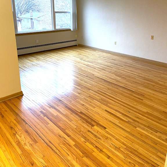 spacious living room with large picture window.