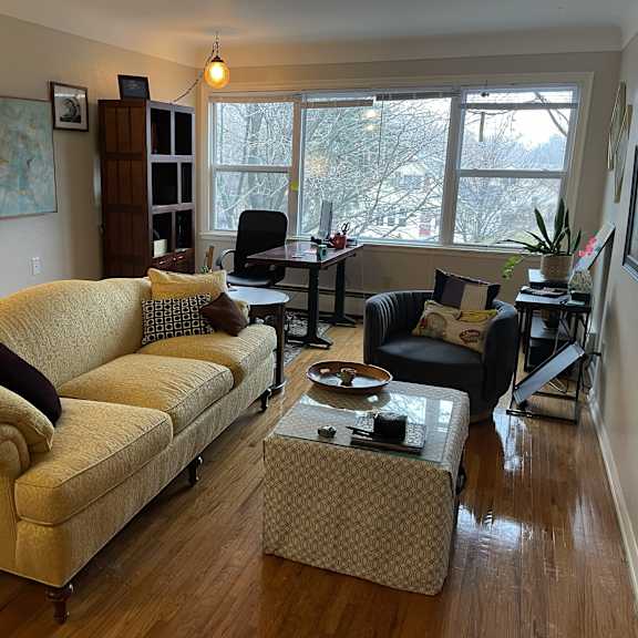 gracious living room with large picture window.