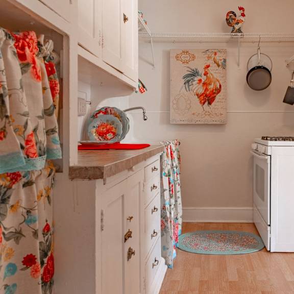 a small laundry room with a washer and dryer.
