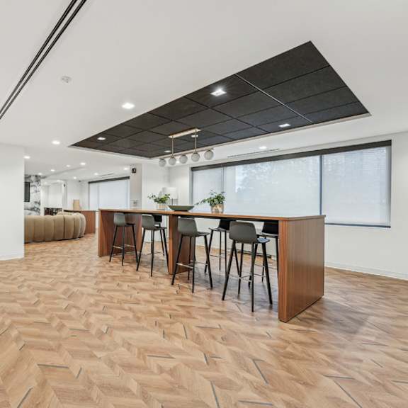 a modern kitchen with a dining table and chairs at sherwood at southern towers, alexandria, 22311