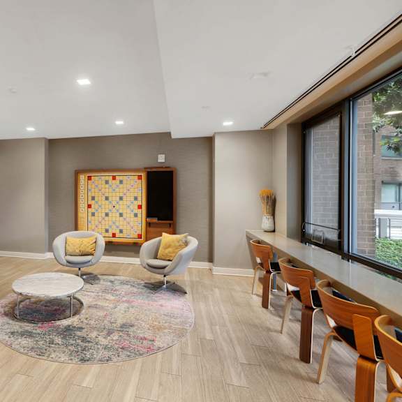 clubroom with desks at the graham at southern towers, alexandria, va