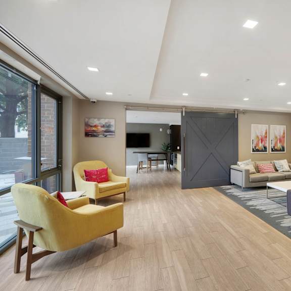 clubroom with natural light at the graham at southern towers, alexandria, virginia