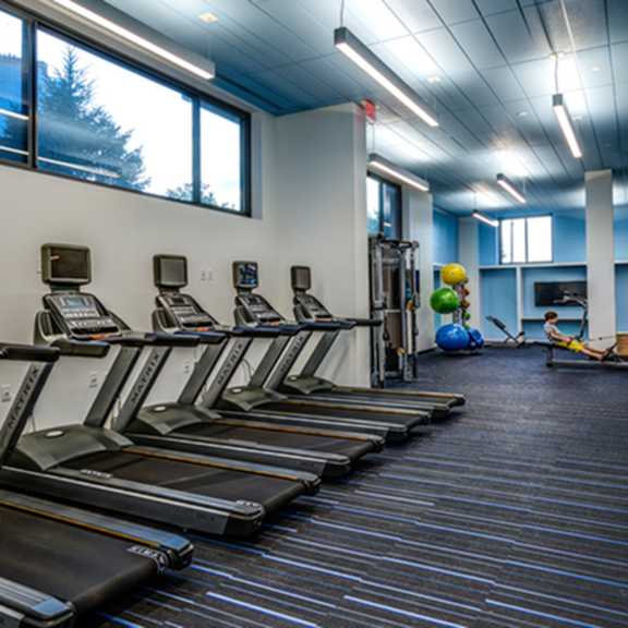 fitness center with treadmills at the graham at southern towers, alexandria, virginia
