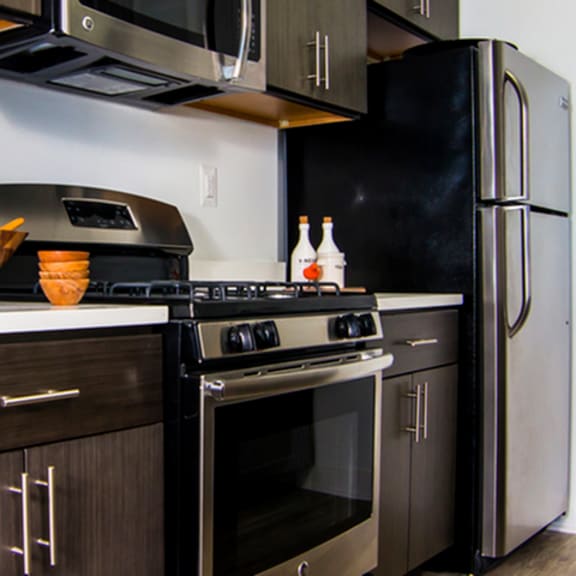 modern kitchen appliances at the graham at southern towers, alexandria, 22311