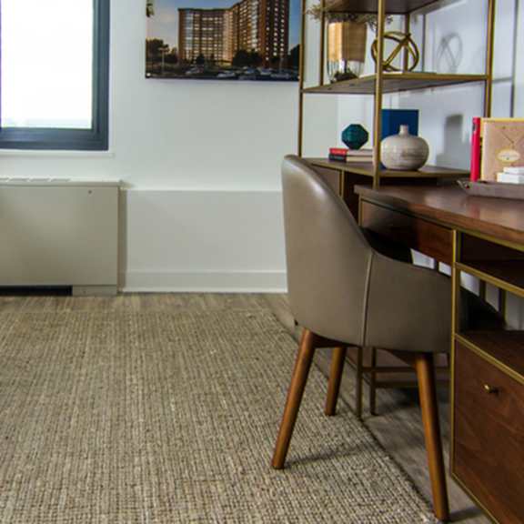 room with desk and chair at the graham at southern towers, virginia