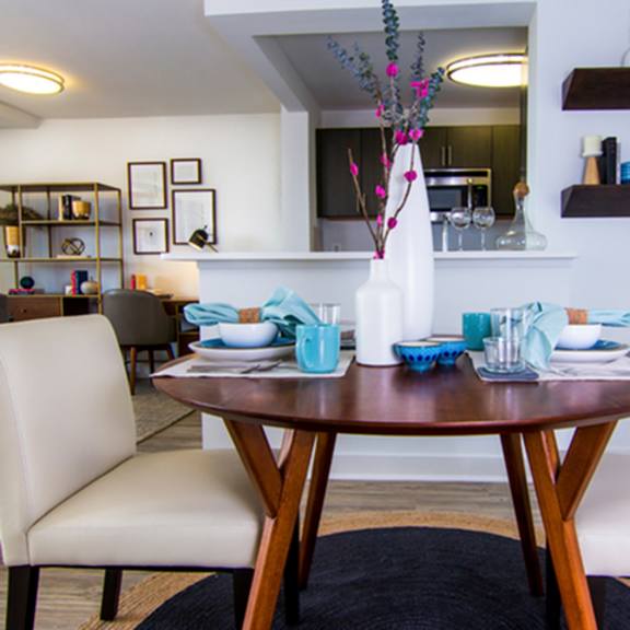 wooden dining table at the graham at southern towers, alexandria, va