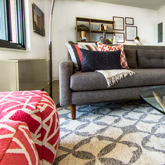 living room with a comfortable couch at the graham at southern towers, virginia, 22311