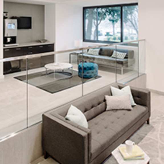 clubhouse with couch at the graham at southern towers, alexandria, 22311