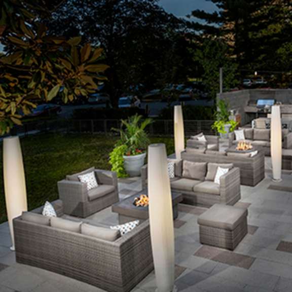 outdoor picnic area with seating arrangement  at the graham at southern towers, alexandria, va
